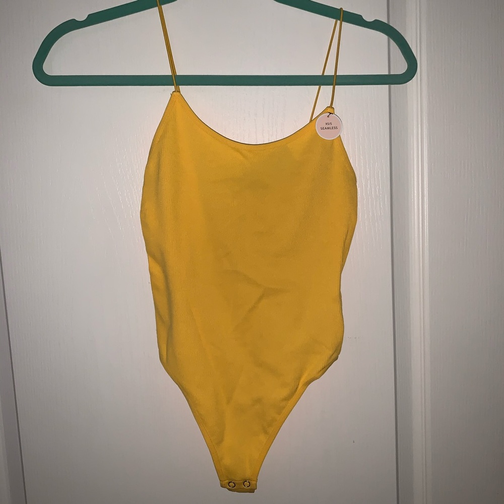 Yellow bodysuit